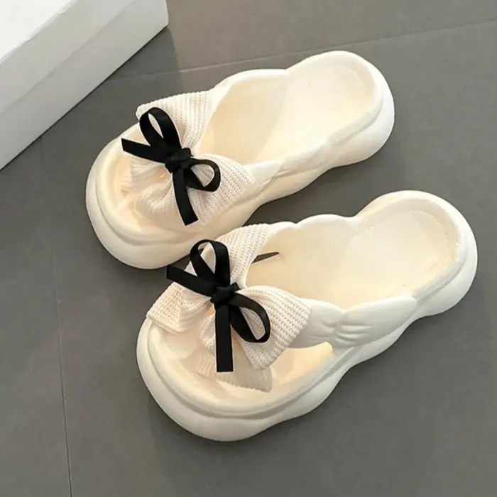 Pantoufles antidérapantes à nœud papillon